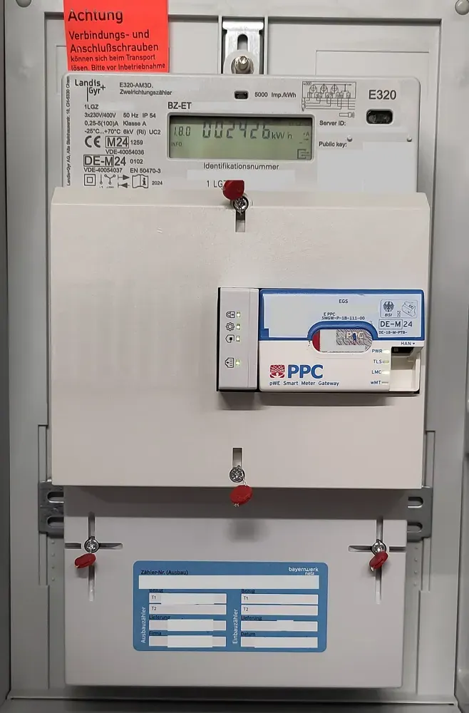 A household electricity meter with a digital display.