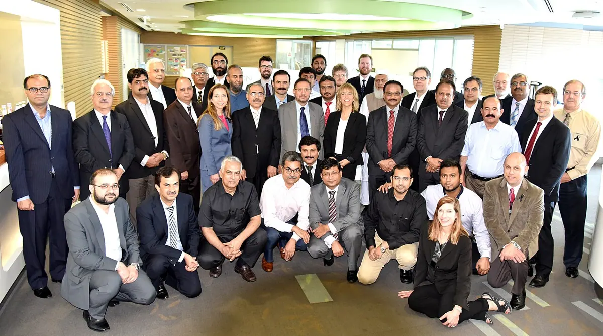Participants gather for a group photograph at an energy planning workshop.
